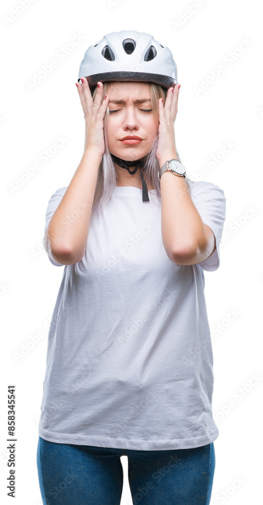Young blonde woman wearing cyclist security helmet over isolated background suffering from headache desperate and stressed because pain and migraine. Hands on head. Young blonde woman wearing cyclist security helmet over isolated background suffering from headache desperate and stressed because pain and migraine. Hands on head.