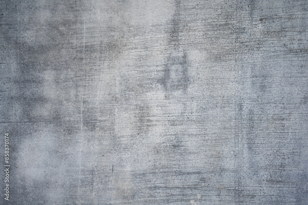 Interesting texture of a grey concrete wall Interesting texture of a grey concrete wall
