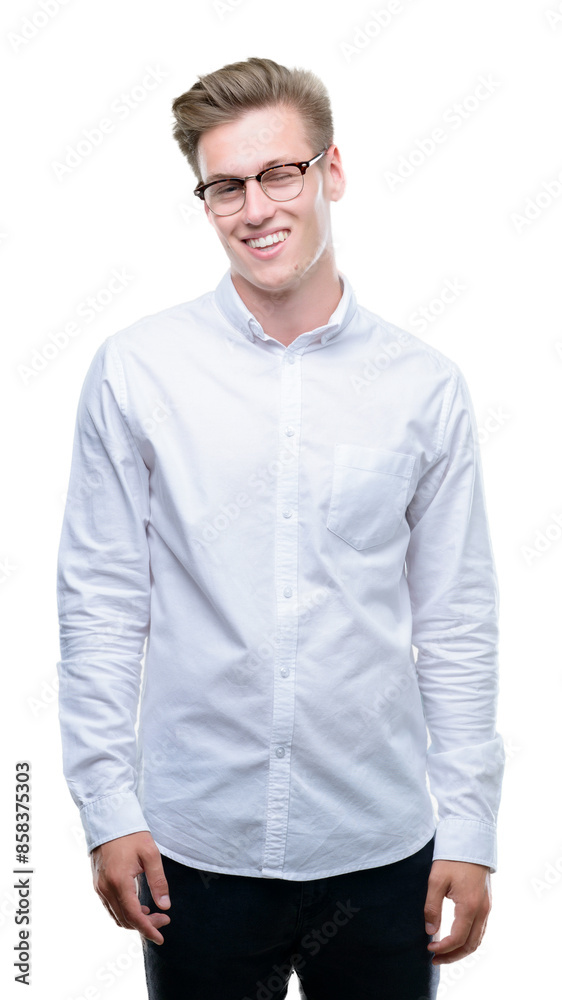 Fototapeta premium Young handsome blond man winking looking at the camera with sexy expression, cheerful and happy face.