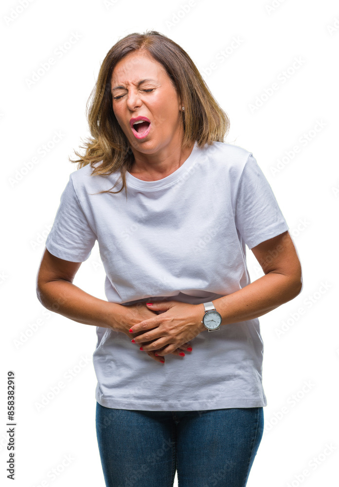 Middle age senior hispanic woman over isolated background with hand on stomach because indigestion, painful illness feeling unwell. Ache concept. Middle age senior hispanic woman over isolated background with hand on stomach because indigestion, painful illness feeling unwell. Ache concept.