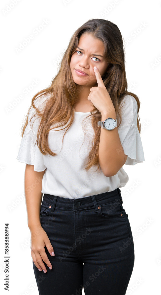 Young beautiful brunette business woman over isolated background Pointing to the eye watching you gesture, suspicious expression Young beautiful brunette business woman over isolated background Pointing to the eye watching you gesture, suspicious expression