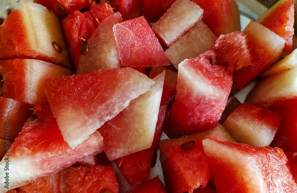 Slices of watermelon in a plate, fruit photography, ripe melon, healthy food background Slices of watermelon in a plate, fruit photography, ripe melon, healthy food background