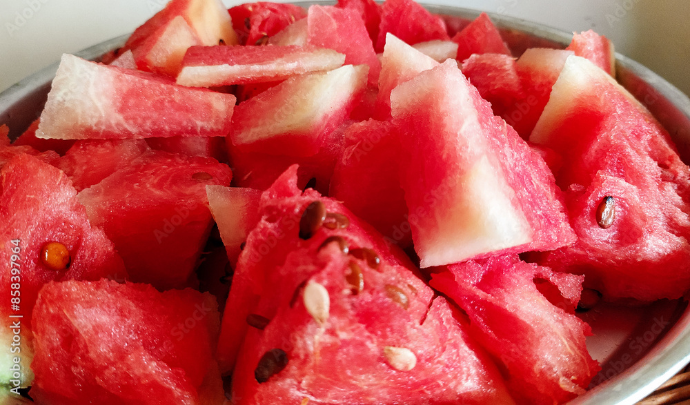 Slices of watermelon in a plate, fruit photography, ripe melon, healthy food background Slices of watermelon in a plate, fruit photography, ripe melon, healthy food background