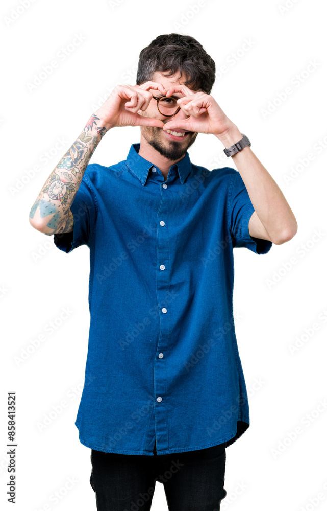 Young handsome man wearing glasses over isolated background Doing heart shape with hand and fingers smiling looking through sign Young handsome man wearing glasses over isolated background Doing heart shape with hand and fingers smiling looking through sign