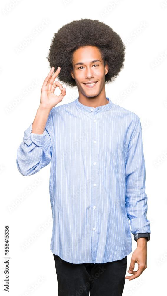Young african american man with afro hair smiling positive doing ok sign with hand and fingers. Successful expression. Young african american man with afro hair smiling positive doing ok sign with hand and fingers. Successful expression.