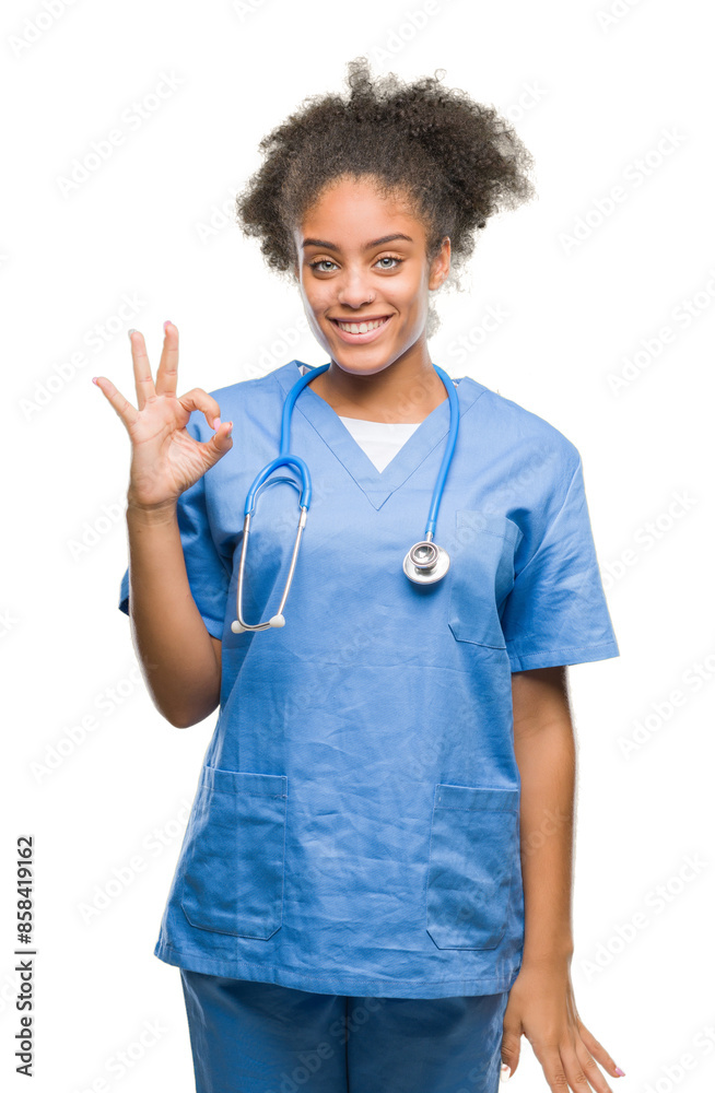 Young afro american doctor woman over isolated background smiling positive doing ok sign with hand and fingers. Successful expression. Young afro american doctor woman over isolated background smiling positive doing ok sign with hand and fingers. Successful expression.