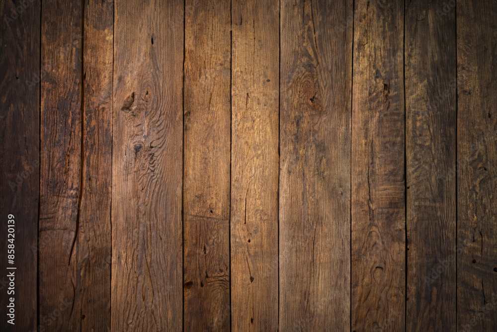 Fototapeta premium Rustic weathered wooden background. Center light area. Textured backdrop.