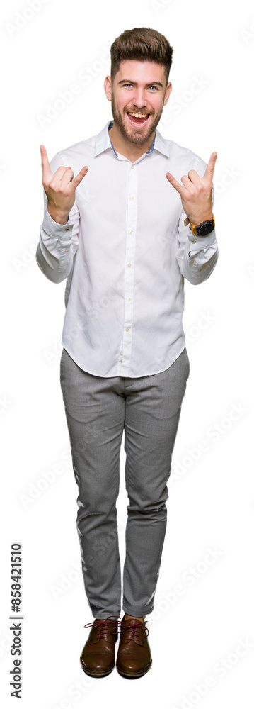Young handsome business man shouting with crazy expression doing rock symbol with hands up. Music star. Heavy concept. Young handsome business man shouting with crazy expression doing rock symbol with hands up. Music star. Heavy concept.