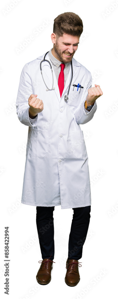 Young handsome doctor man wearing medical coat very happy and excited doing winner gesture with arms raised, smiling and screaming for success. Celebration concept. Young handsome doctor man wearing medical coat very happy and excited doing winner gesture with arms raised, smiling and screaming for success. Celebration concept.