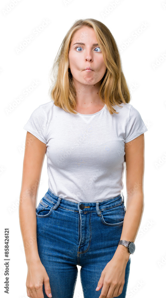 Beautiful young woman wearing casual white t-shirt over isolated background making fish face with lips, crazy and comical gesture. Funny expression. Beautiful young woman wearing casual white t-shirt over isolated background making fish face with lips, crazy and comical gesture. Funny expression.