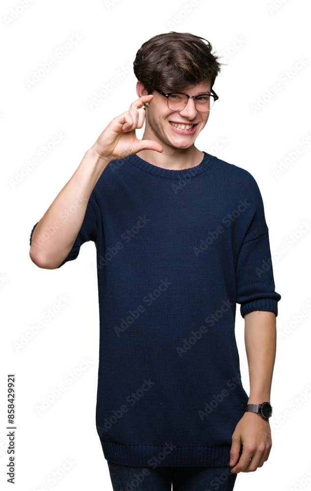 Young handsome man wearing glasses over isolated background smiling and confident gesturing with hand doing size sign with fingers while looking and the camera. Measure concept. Young handsome man wearing glasses over isolated background smiling and confident gesturing with hand doing size sign with fingers while looking and the camera. Measure concept.