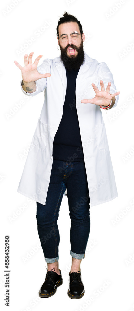 Doctor therapist man with long hair and bear wearing white coat afraid and terrified with fear expression stop gesture with hands, shouting in shock. Panic concept. Doctor therapist man with long hair and bear wearing white coat afraid and terrified with fear expression stop gesture with hands, shouting in shock. Panic concept.