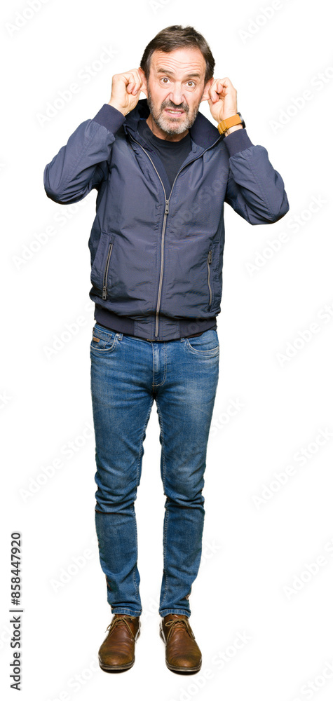 Middle age handsome man wearing a jacket Smiling pulling ears with fingers, funny gesture. Audition problem Middle age handsome man wearing a jacket Smiling pulling ears with fingers, funny gesture. Audition problem