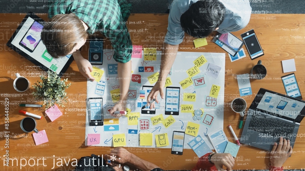 Top down view of software developer using mind map brainstorm about ...