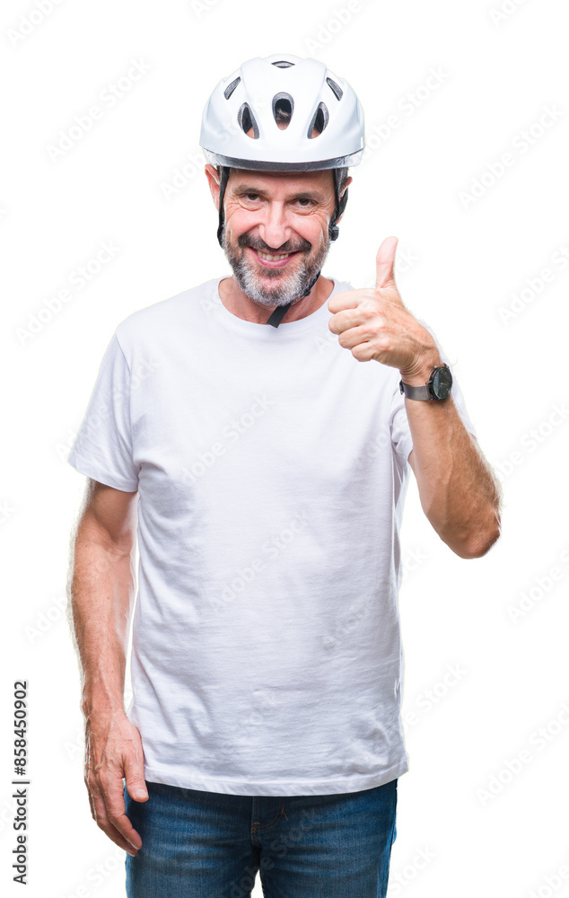 Middle age senior hoary cyclist man wearing bike safety helment isolated background doing happy thumbs up gesture with hand. Approving expression looking at the camera with showing success. Middle age senior hoary cyclist man wearing bike safety helment isolated background doing happy thumbs up gesture with hand. Approving expression looking at the camera with showing success.