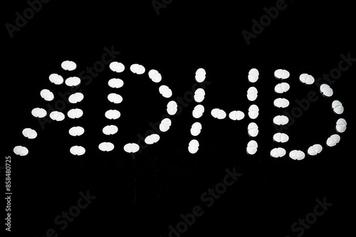 Generic Adderall pills arrange to spell ADHD (Attention Deficit Hyperactivity Disorder) help for young people photo