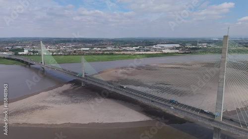 Aerial view of the Mersey Gateway Bridge connecting Runcorn and Widnes over the River Mersey photo