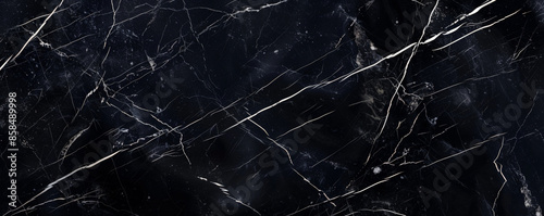 Sleek black marble background with subtle white veining and a smooth, polished texture. The luxurious, modern look adds sophistication and elegance, ideal for high-end designs