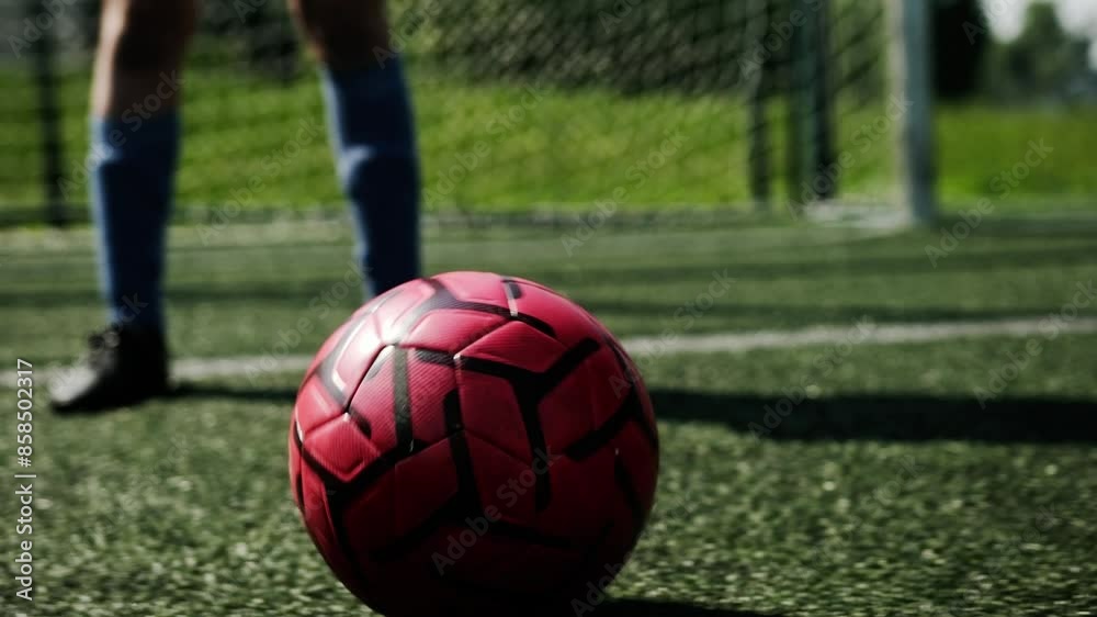 Soccer Ball Moving Across Green Grass During A Soccer Game Soccer Ball Moving Across Green Grass During A Soccer Game
