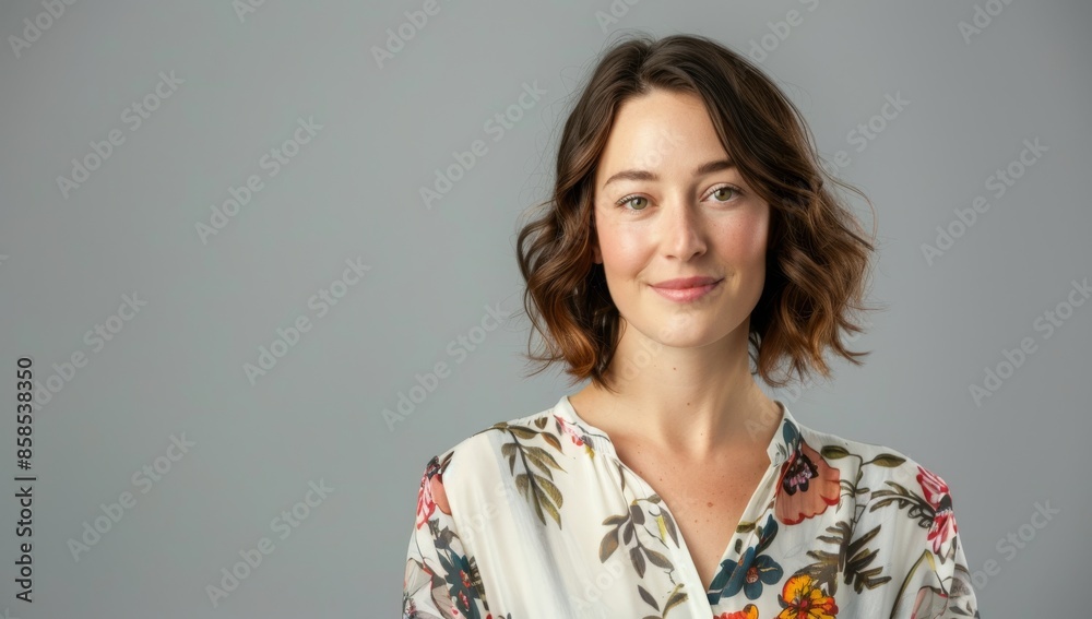 Middle age beautiful business woman wearing glasses standing over isolated gray background looking to side, relax profile pose with natural face and confident smile. Middle age beautiful business woman wearing glasses standing over isolated gray background looking to side, relax profile pose with natural face and confident smile.