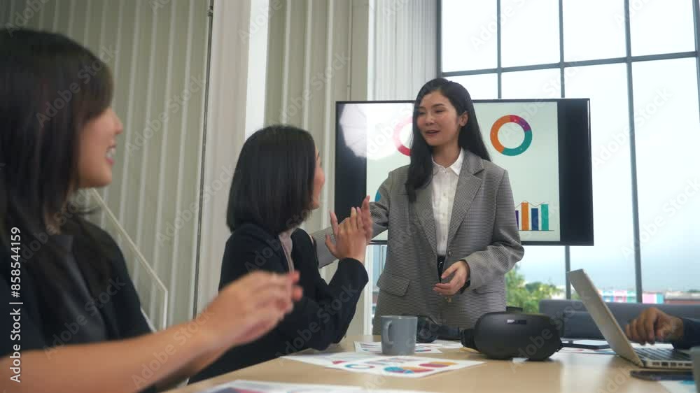 Happy diverse group Asian business start up freelance team analyzing statistics financial. Group Team of business people meeting conference discussion various topic corporate concept in office.	