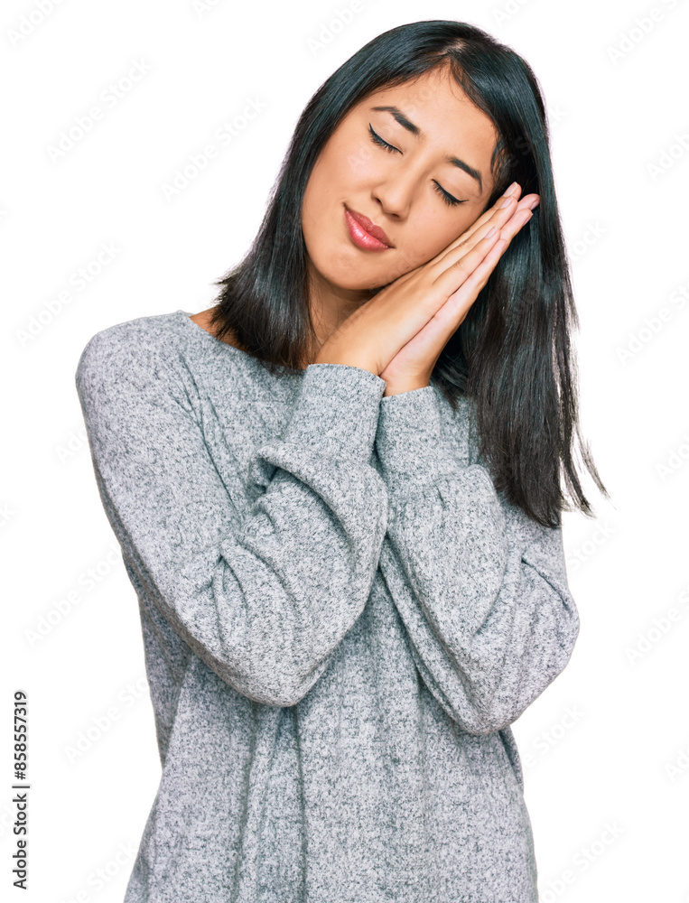 Beautiful asian young woman wearing casual clothes sleeping tired dreaming and posing with hands together while smiling with closed eyes. Beautiful asian young woman wearing casual clothes sleeping tired dreaming and posing with hands together while smiling with closed eyes.