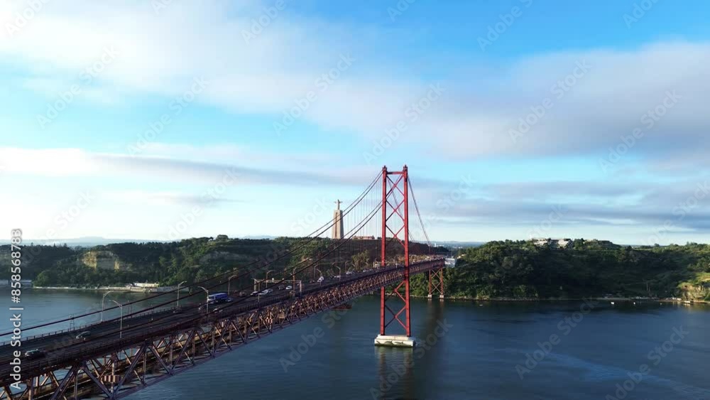 25th April Bridge from the air in Lisbon Portugal. Cristo Rei Statue at the background