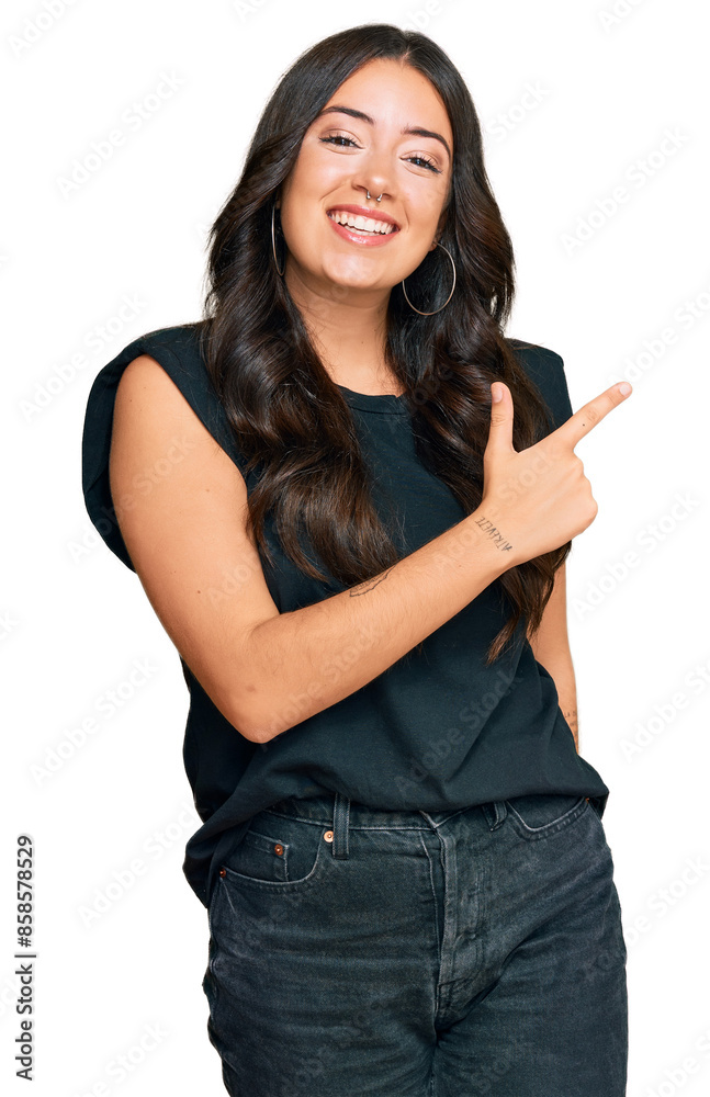 Beautiful brunette young woman wearing black shirt cheerful with a smile of face pointing with hand and finger up to the side with happy and natural expression on face Beautiful brunette young woman wearing black shirt cheerful with a smile of face pointing with hand and finger up to the side with happy and natural expression on face
