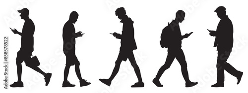 Silhouettes of 5 walking men using phones on the go. Side view. Black and white vector illustration.