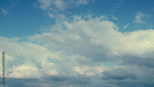 Puffy Fluffy Colored Clouds. Summer Blue Sky. Beautiful Nature Rainy Clouds At Day Time.
