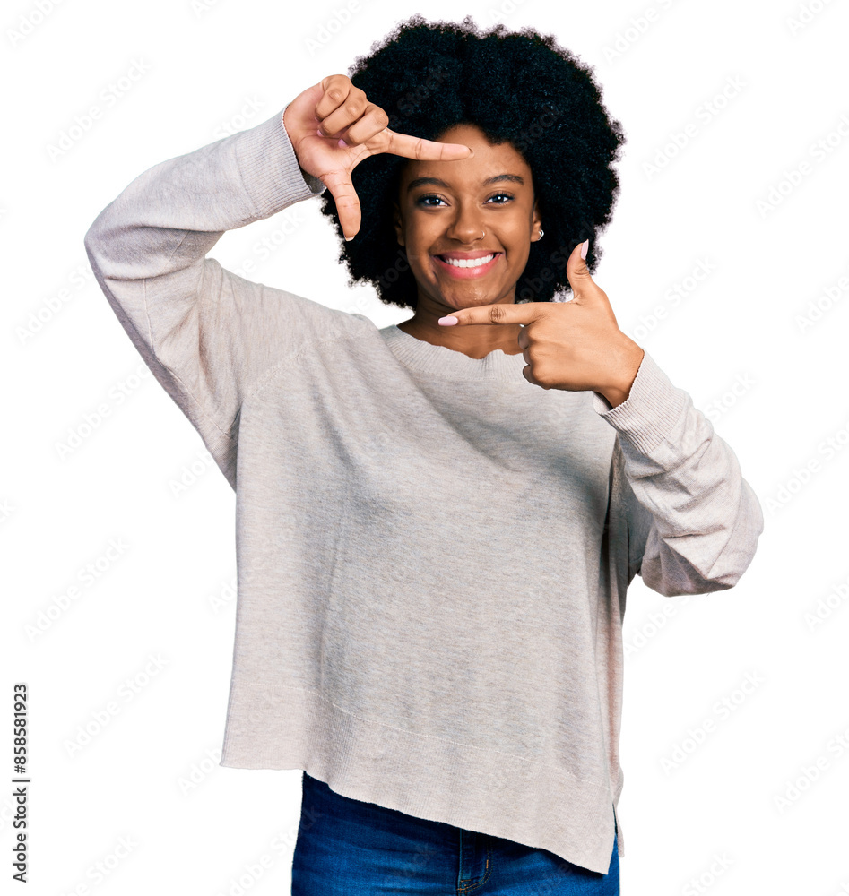 Φωτογραφία Young african american woman wearing casual clothes smiling making frame with hands and fingers with happy face