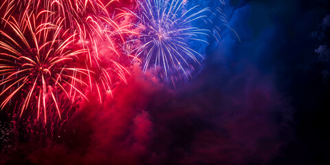 Red and blue fireworks in corner with copyspace, border, frame, wide banner
