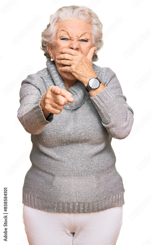 Φωτογραφία Senior grey-haired woman wearing casual winter sweater laughing at you, pointing