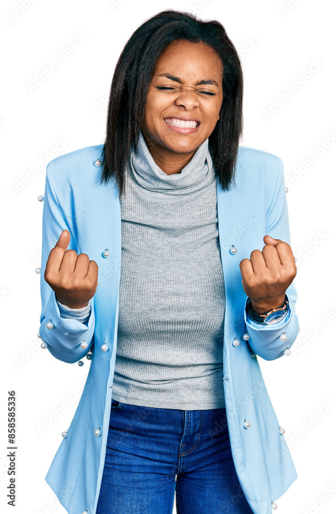 Φωτογραφία Beautiful hispanic woman wearing business jacket very happy and excited doing winner gesture with arms raised, smiling and screaming for success