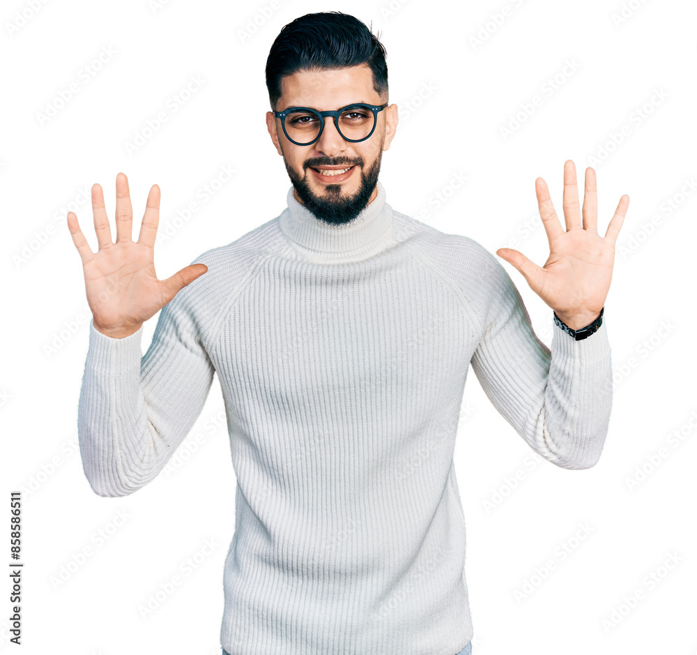 Young arab man with beard wearing elegant turtleneck sweater and glasses showing and pointing up with fingers number ten while smiling confident and happy. Young arab man with beard wearing elegant turtleneck sweater and glasses showing and pointing up with fingers number ten while smiling confident and happy.