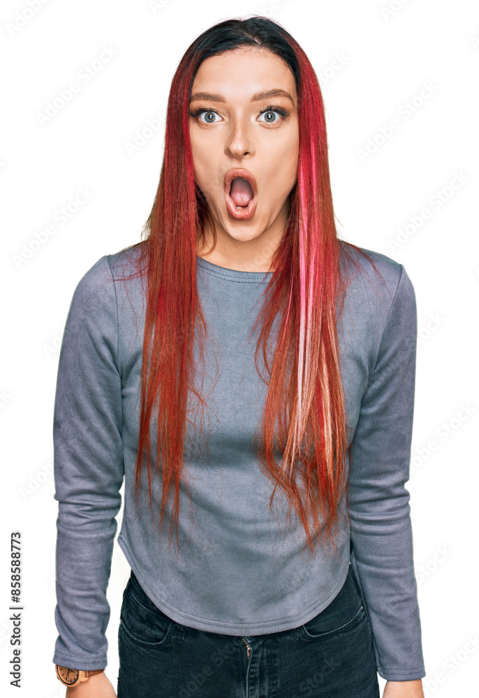 Young caucasian woman wearing casual clothes afraid and shocked with surprise expression, fear and excited face. Young caucasian woman wearing casual clothes afraid and shocked with surprise expression, fear and excited face.