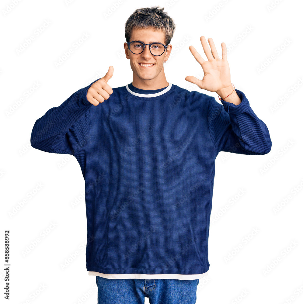 Φωτογραφία Young handsome man wearing casual clothes and glasses showing and pointing up with fingers number six while smiling confident and happy