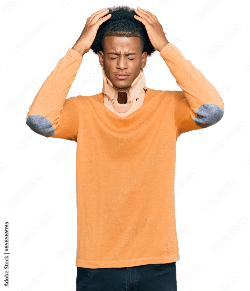 African american man with afro hair wearing cervical neck collar suffering from headache desperate and stressed because pain and migraine. hands on head. African american man with afro hair wearing cervical neck collar suffering from headache desperate and stressed because pain and migraine. hands on head.