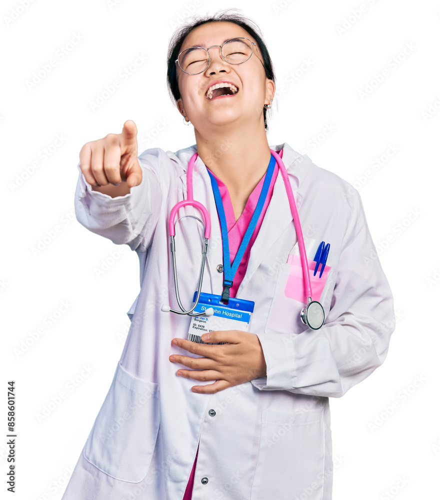 Young chinese woman wearing doctor uniform and stethoscope laughing at you, pointing finger to the camera with hand over body, shame expression Young chinese woman wearing doctor uniform and stethoscope laughing at you, pointing finger to the camera with hand over body, shame expression