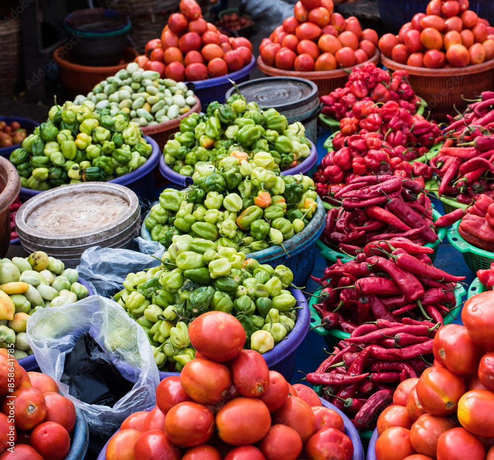 Pepper and tomato for sale at a market in Ogun State, Nigeria Pepper and tomato for sale at a market in Ogun State, Nigeria