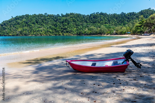 Boat on the  beach at Koh Phayam, Thailand photo