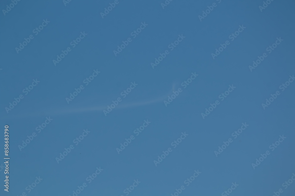Blue sky with a faint swoosh cloud, Blue sky with a faint swoosh cloud,