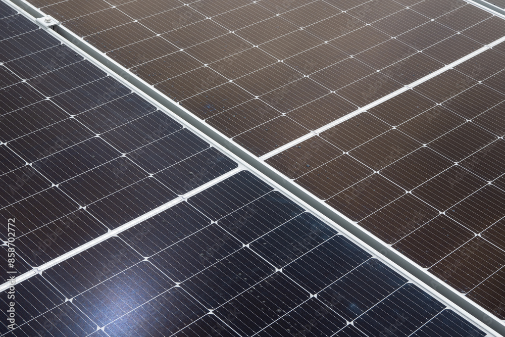 Solar panels installed on rooftop with cloudy sky Solar panels installed on rooftop with cloudy sky