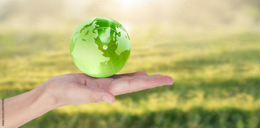 Globe ,earth in human hand, holding our planet glowing. Earth image provided by Nasa