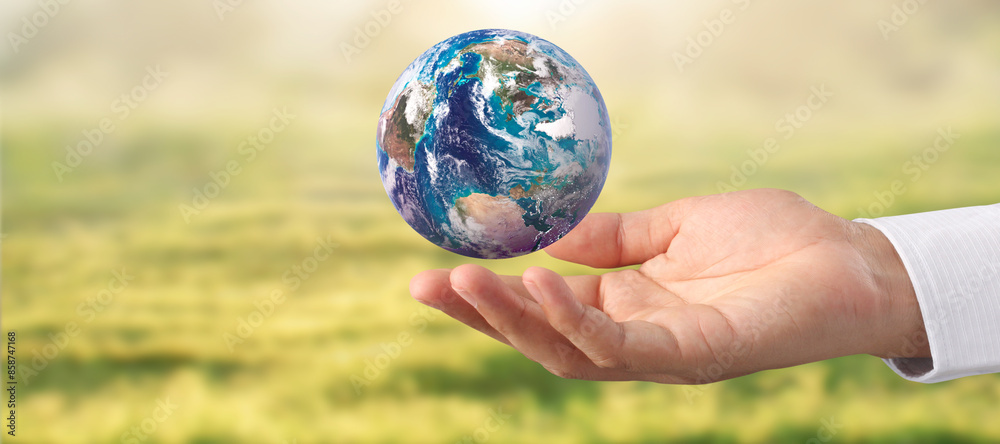 Globe ,earth in human hand, holding our planet glowing. Earth image provided by Nasa Globe ,earth in human hand, holding our planet glowing. Earth image provided by Nasa