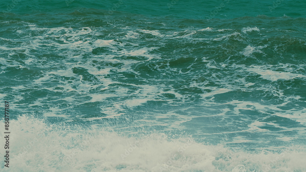 Obraz premium Stormy Sea. Power Of Waves Breaking Splashing. Mighty Ocean Wave Rolling Slowly And Crashing Against Coast.