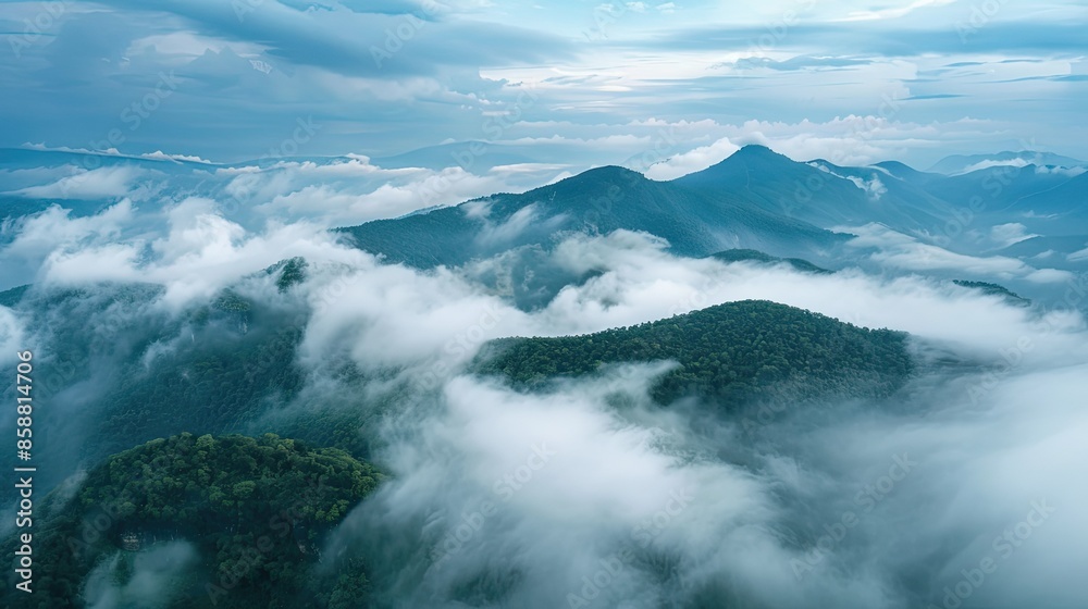 Obraz premium Scenic mountain view. Aerial cloudscape with clouds rolling over foggy mountain ridges AI generated