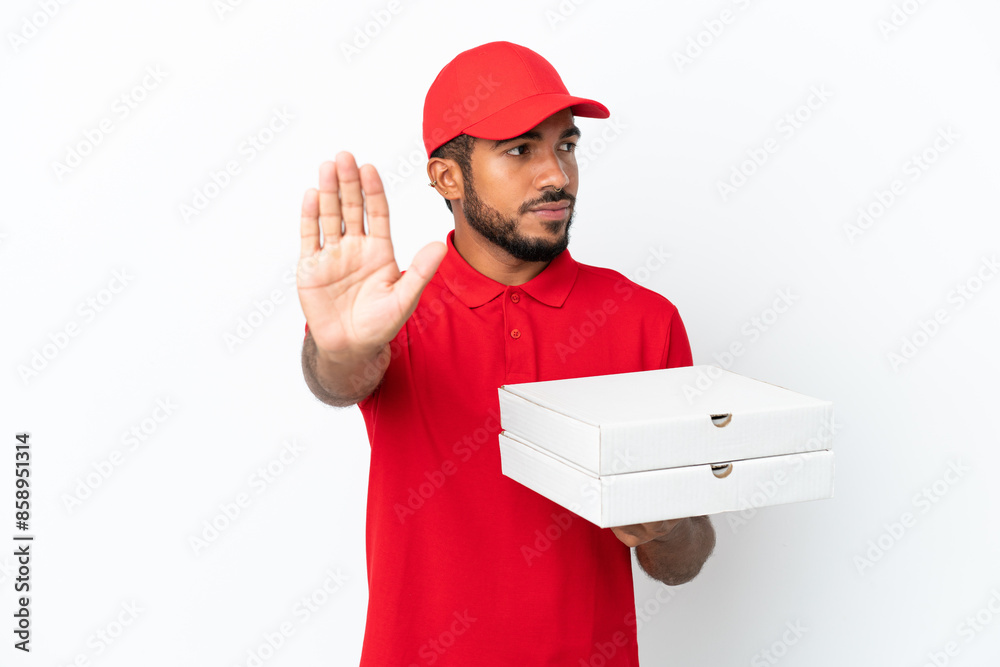pizza delivery man picking up pizza boxes isolated on white background making stop gesture and disappointed pizza delivery man picking up pizza boxes isolated on white background making stop gesture and disappointed