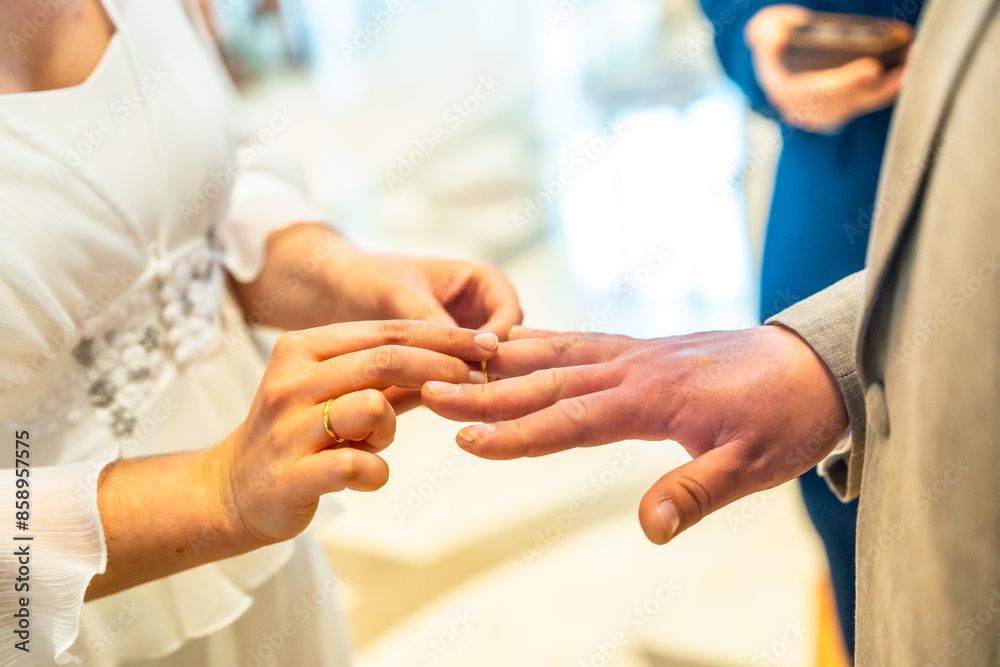 Fototapeta premium A man and woman are getting married