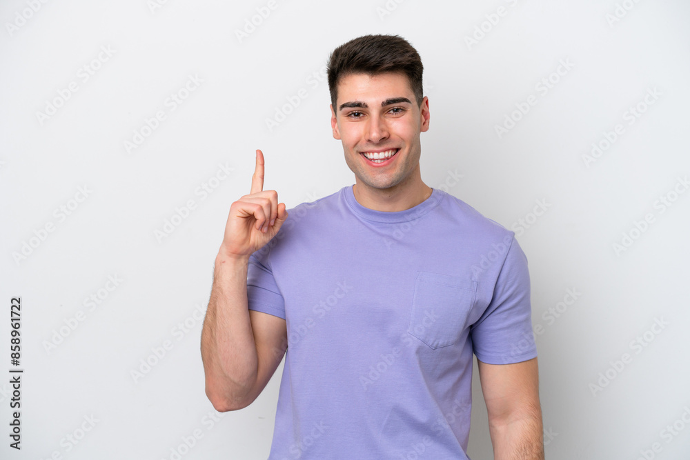 Young caucasian man isolated on white background showing and lifting a finger in sign of the best Young caucasian man isolated on white background showing and lifting a finger in sign of the best